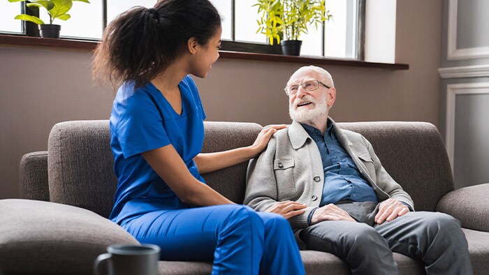 Female doctor and patient on seats