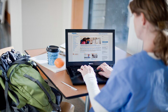 Doctor using laptop